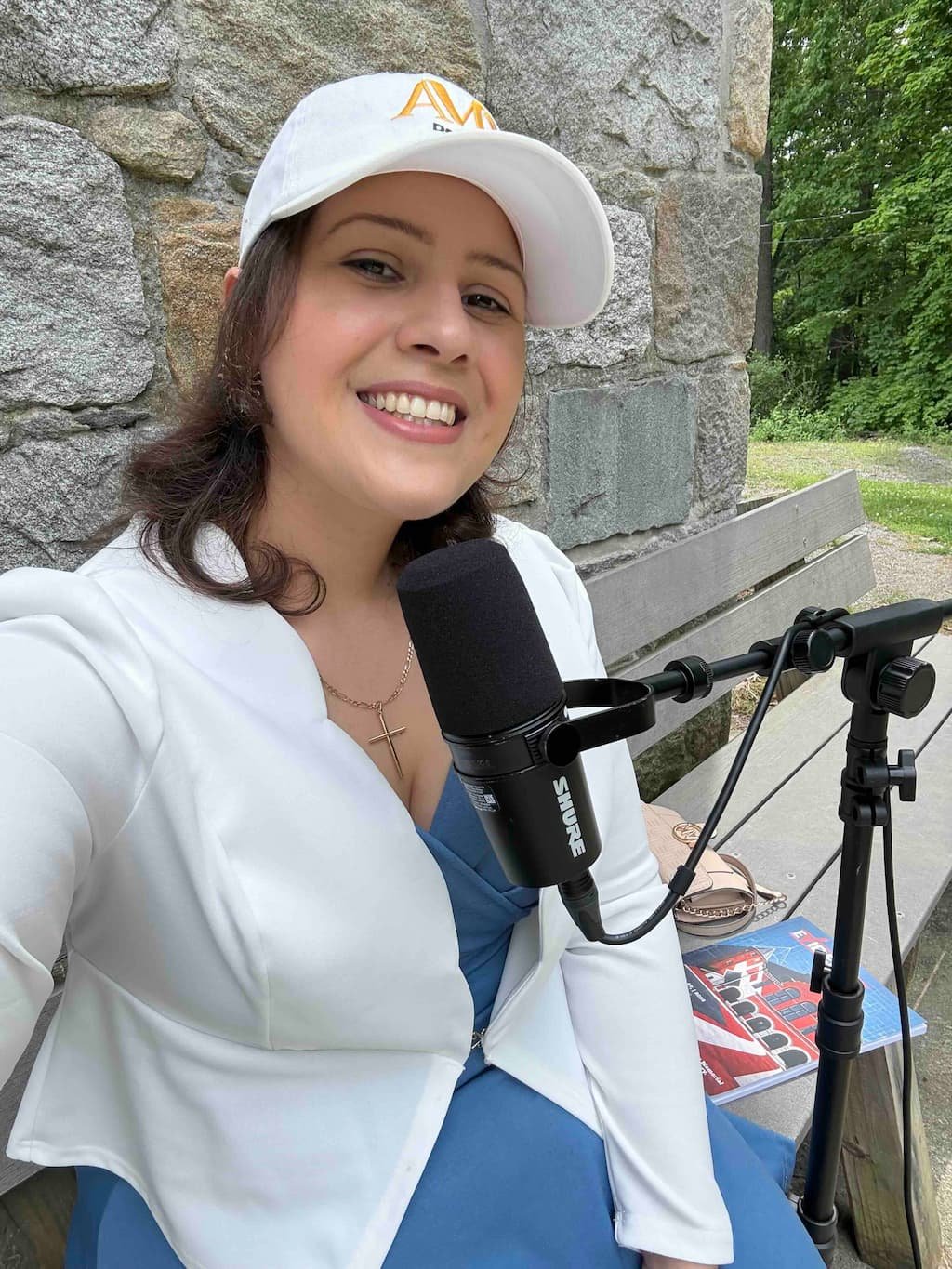 Ana sharing insights on microphone